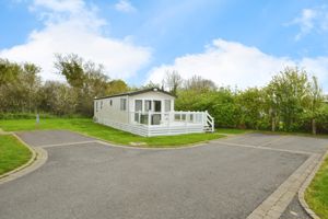 Detached holiday home on corner plot with parking- click for photo gallery